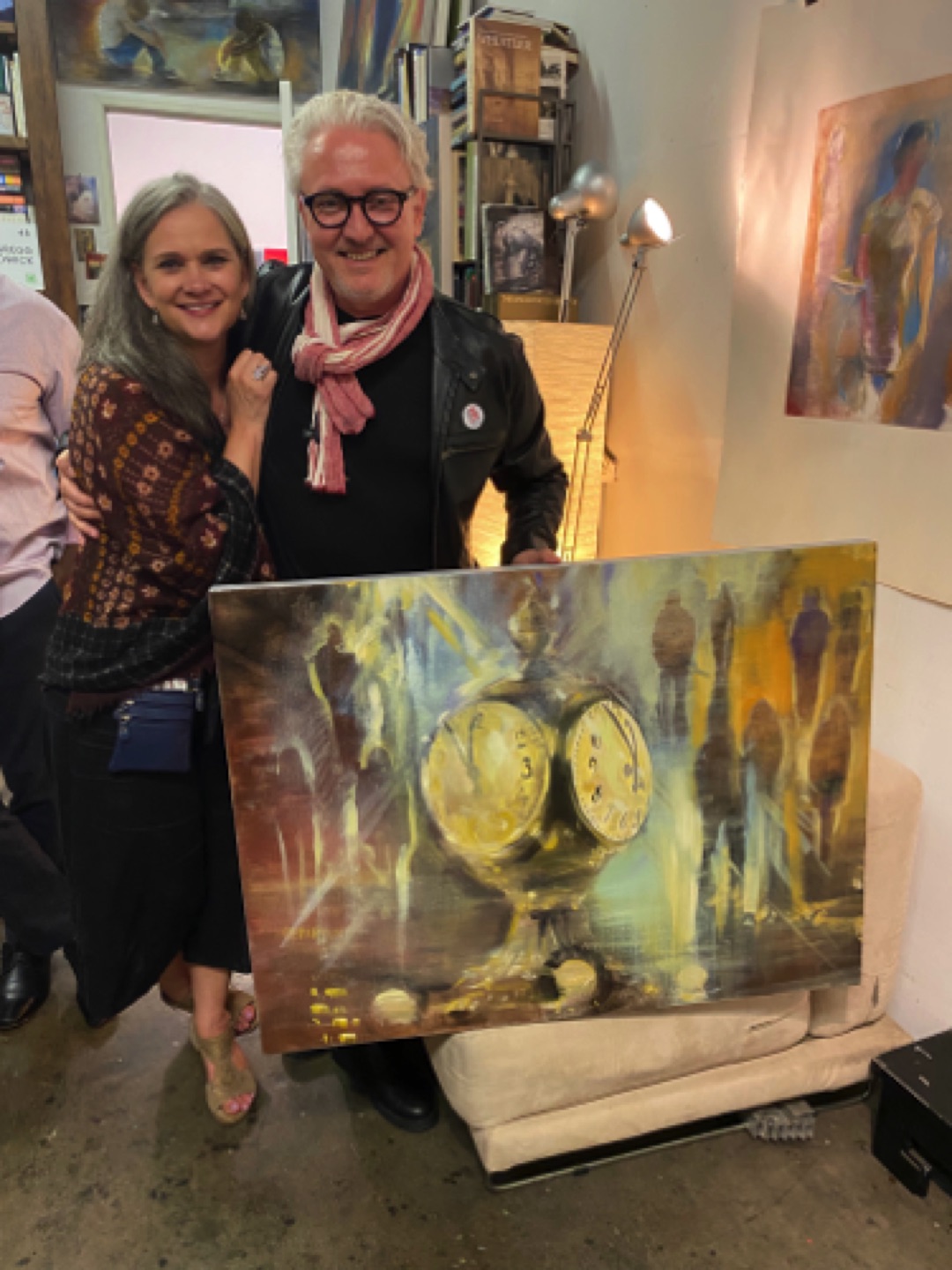 Amy and Ludek Drizhal with their new Chadwick painting. “New York Stories”